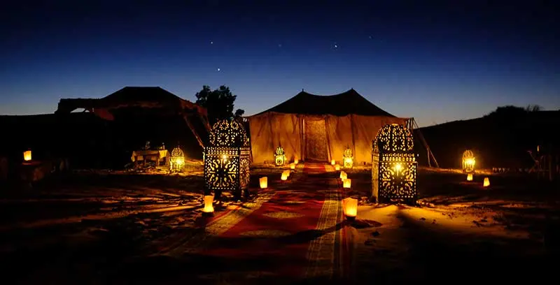 Overnight desert safari Bedouin camp at night near Abu Dhabi