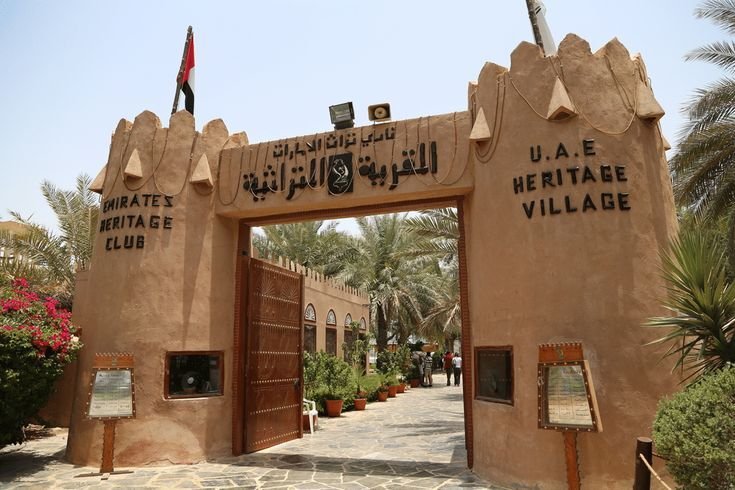 Traditional gateway entrance of Emirates Heritage Village on Abu Dhabi City Tour